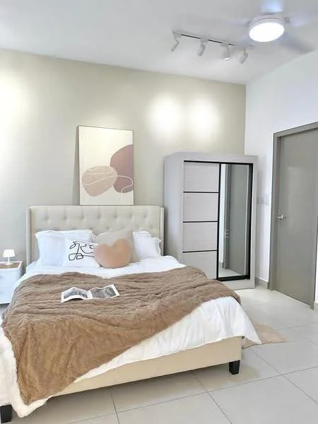 Bedroom features: king-size bed with upholstered headboard, white bedding with decorative pillows, brown throw blanket, nightstand with lamp, framed artwork on wall, built-in wardrobe with sliding doors, white walls, tile flooring, recessed ceiling lights, ceiling light fixture; style: modern.