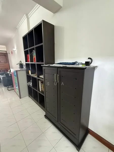Room features: white painted walls, tile flooring, dark wood storage cabinet, open shelving unit, documents and books on shelves, desk lamp, visible electrical outlet; style: modern.