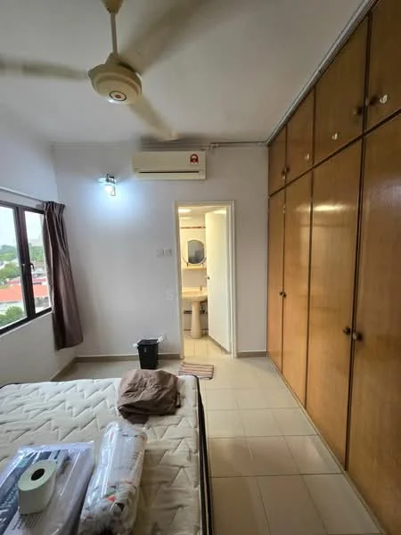 Bedroom features: queen-size bed, built-in wardrobe with wooden doors, floor-to-ceiling window, curtains, wall-mounted split AC, ceiling fan, tile flooring, light fixture, neutral wall color, doorway leading to bathroom.