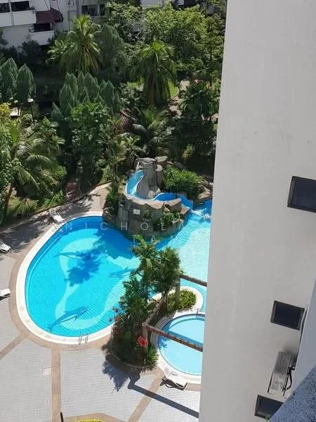 Exterior type: swimming pool deck; features: infinity pool, water feature with rock formation, surrounding tropical landscaping, palm trees, pool deck with loungers, jacuzzi, children's splash pool, stone-paved walkway; style: tropical-modern.