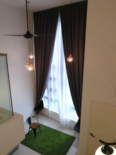 Room features: large floor-to-ceiling window, sheer curtains, dark grey curtains, pendant lights with glass shades, ceiling fan, green area rug, small wooden chair, white walls, polished tile flooring; style: modern.