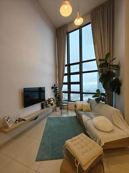 Living features: large floor-to-ceiling windows, light grey fabric sofa, wooden coffee table, TV mounted on wall, light wood floating TV console, green area rug, potted indoor plants, curtains in light beige, pendant lighting fixtures, decorative wall art, neutral painted walls, tile flooring; style: modern; view: city.