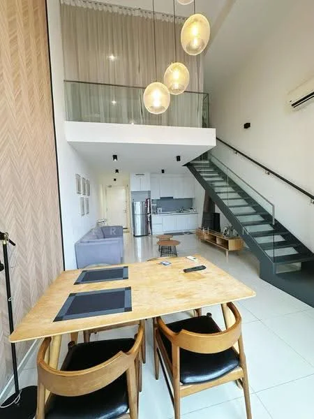 Living features: high ceiling, glass railing, wooden dining table, black dining chairs, pendant lighting, open-plan layout, white walls, tile flooring, stainless-steel fridge, kitchen area visible, staircase with glass steps, wall-mounted TV, media console; style: modern.
