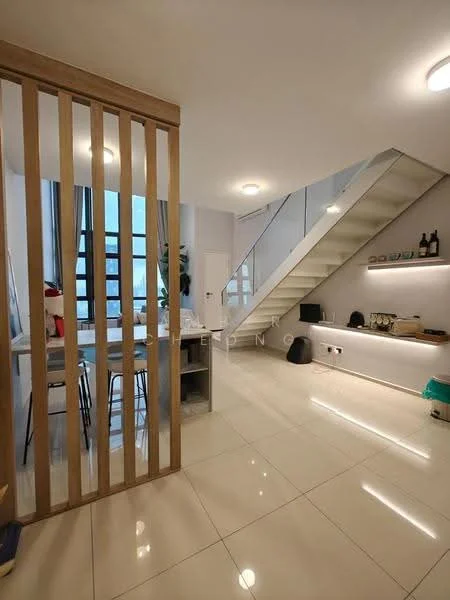 Room features: white painted walls, glossy tile flooring, stainless-steel staircase with glass railing, recessed downlights, large windows with grid pattern, open-plan layout, wooden partition, shelving unit with decorative items, dining table with chairs; style: modern.