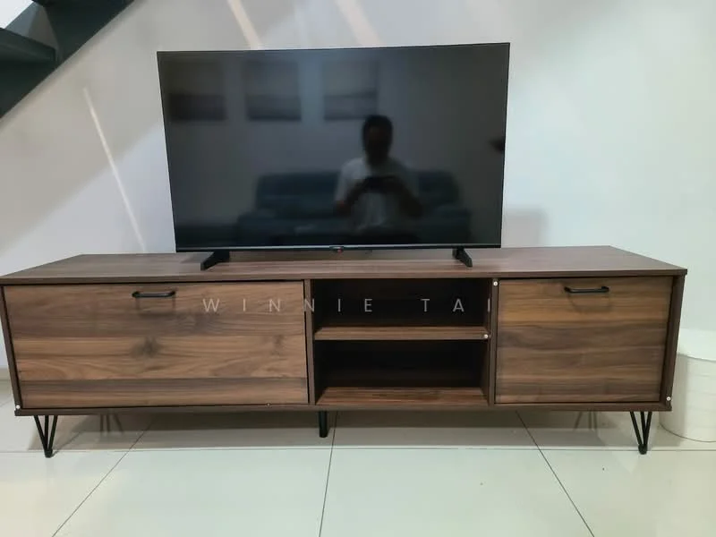 Living features: wooden TV console with two cabinets, open shelving, black metal legs on console, large flat-screen TV, white wall, glossy tile flooring, sofa in background, decorative artwork on wall; style: modern.
