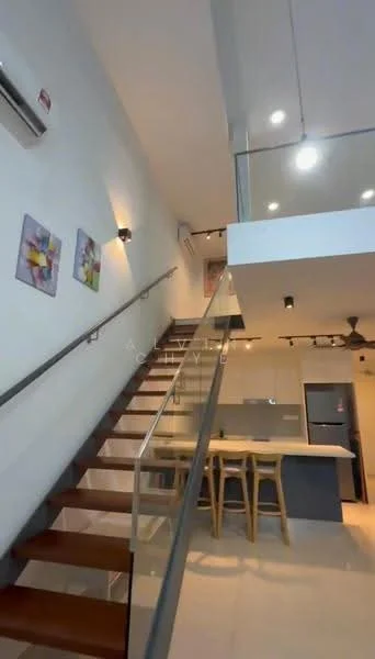 Room features: staircase with wooden steps, glass railing, white painted walls, recessed downlights, wall-mounted artwork, open-plan layout, ceiling fan, kitchen island with bar stools, kitchen cabinetry, floor-to-ceiling windows, tile flooring; style: modern.