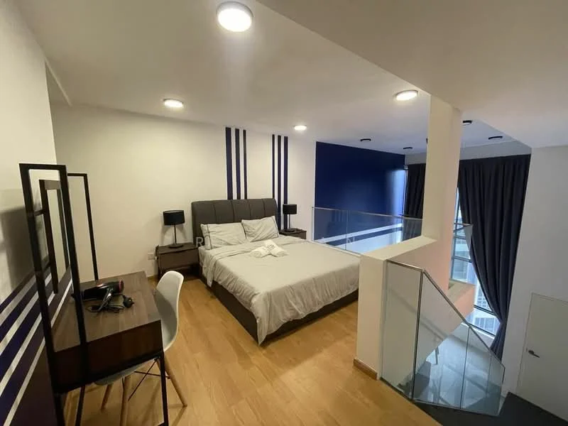 Bedroom features: king-size bed with grey upholstered headboard, white bedding, wooden flooring, desk with chair, black bedside lamps, glass railing, blue accent wall, white walls, recessed ceiling lights; style: modern.