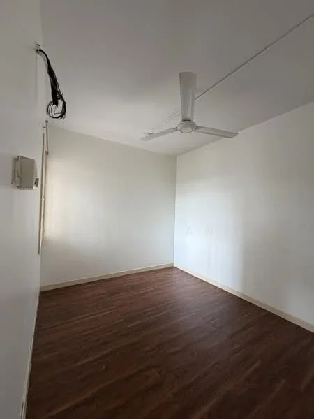 Room features: white painted walls, wooden flooring, ceiling fan, no visible windows, no visible furniture, no visible decor, no visible appliances, no visible storage.