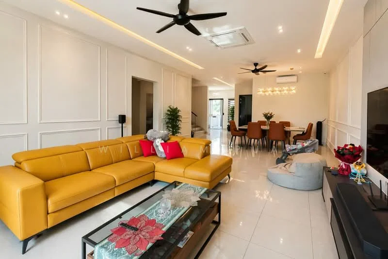 Living features: yellow leather sectional sofa, glass coffee table with decorative items, wall-mounted TV, recessed LED downlights, 5-blade ceiling fan, white painted walls with paneling, polished ceramic tile flooring, decorative wall art, area rug with geometric pattern; style: modern. Dining features: 6-seater dining table, upholstered dining chairs, decorative vase with flowers, open layout to living area; style: modern.