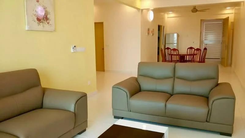 Living features: 2-seater leather sofa in light grey, 3-seater leather sofa in light grey, coffee table with dark wood surface, white tiled flooring, yellow painted walls, ceiling fan, wall-mounted artwork, open layout to dining area; style: modern. Dining features: 6-seater dining table with red chairs, white tiled flooring, yellow painted walls, open layout to living area; style: modern.