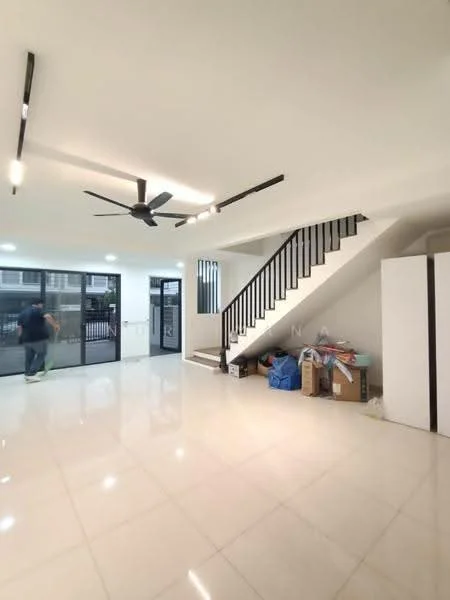Living features: white painted walls, polished ceramic tile flooring, 5-blade ceiling fan with light, large windows with black metal grills, staircase with black railing, open layout, natural light from windows, storage cabinet, boxes and items in the corner; style: modern.