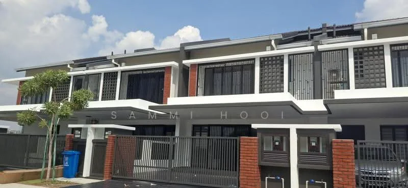 Exterior type: linked terrace house; features: white painted facade, red brick accents, horizontal louvre screens, flat roof, two-storey structure, manicured lawn, paved driveway, security gate, visible mailboxes, surrounded by greenery; style: modern.