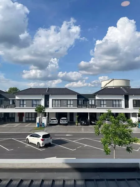 Exterior type: linked terrace house; features: two-storey linked terrace houses, grey painted facade, pitched tile roof, manicured lawn, parking spaces visible, surrounded by mature greenery, clear blue sky, white car parked in front, multiple vehicles in parking area; style: modern.