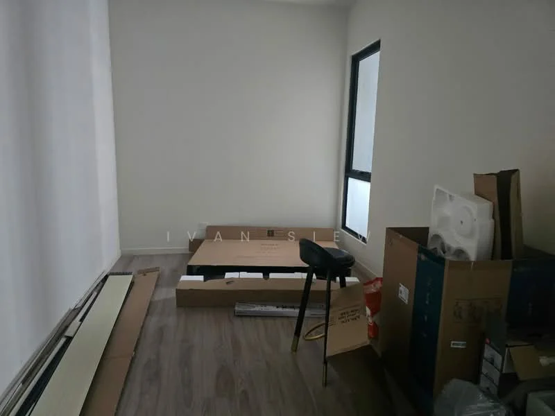 Room features: light wood laminate flooring, white painted walls, large window with black frame, cardboard boxes, stool, unassembled furniture, minimal decor; style: minimalist.