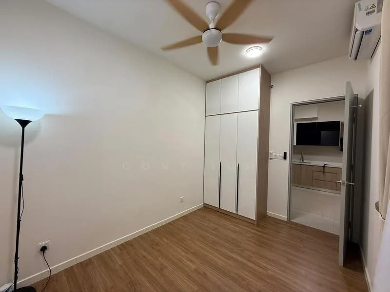 Room features: wooden flooring, white painted walls, 5-blade ceiling fan, wall-mounted split AC, floor lamp, built-in wardrobe with sliding doors, door leading to another room, kitchenette visible in the background; style: modern.