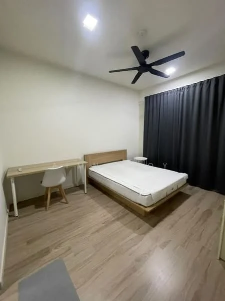 Bedroom features: queen-size bed without mattress, wooden bed frame, study desk with chair, dark grey curtains, 5-blade ceiling fan, light-colored walls, laminate flooring, area rug in grey; style: modern.
