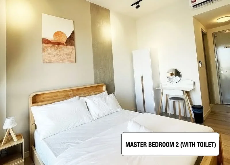 Bedroom features: king-size bed with white bedding, wooden headboard, decorative wall art with sunset design, light wood flooring, white wardrobe, vanity table with round mirror, waste bin, wall-mounted air conditioning unit, neutral painted walls, window with natural light; style: modern.