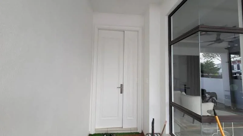 Room features: white painted walls, glass windows, door with handle, flooring visible, ceiling with ceiling fan.