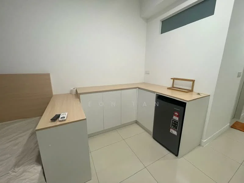 Room features: white painted walls, light wood countertop, white cabinetry, black fridge, tile flooring, small wooden shelf, remote control on countertop; style: modern.