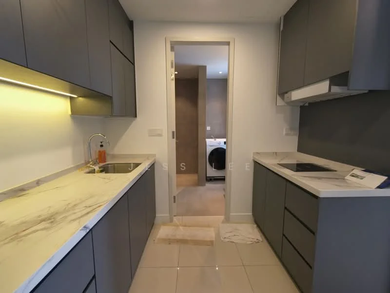 Kitchen features: grey flat-panel cabinets, marble countertop, single-bowl stainless-steel sink, chrome pull-down faucet, built-in induction hob, built-in oven, white backsplash, recessed LED downlights, tile flooring, open layout to hallway; style: modern.