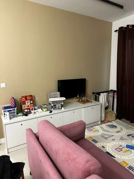 Living features: pink fabric sofa, white TV console, wall-mounted TV, decorative toys, area rug with geometric pattern, cream painted walls, dark brown curtains, white shelving unit; style: modern.