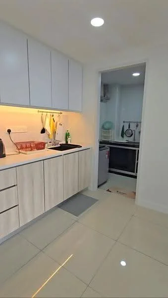 Kitchen features: white cabinetry with flat-panel doors, light wood lower cabinets, black countertop, single-bowl stainless-steel sink, chrome pull-down faucet, built-in oven, stainless-steel fridge, ceramic tile flooring, recessed LED downlights, wall-mounted kitchen utensils rack, kitchen backsplash, open shelving, window above sink; style: modern. Room features: additional countertop space, appliances visible, light-colored walls.