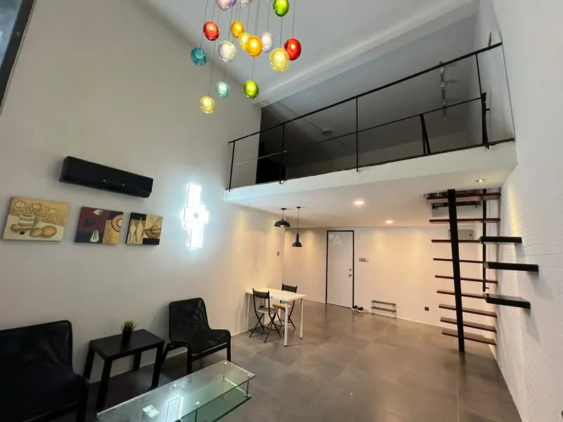 Living features: grey polished concrete flooring, white painted walls, exposed brick wall, modern pendant lighting with colorful bulbs, glass coffee table, black leather armchairs, dining table with black chairs, spiral staircase leading to upper level, wall-mounted air conditioning unit, decorative artwork on walls; style: modern.