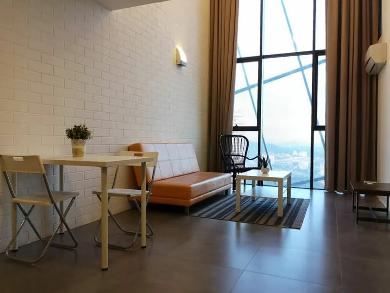 Living features: white painted walls, grey tile flooring, floor-to-ceiling windows, brown leather sofa, white coffee table, black accent chair, area rug with geometric pattern, dining table with two chairs, sheer curtains, wall-mounted air conditioning unit; style: modern; view: city.