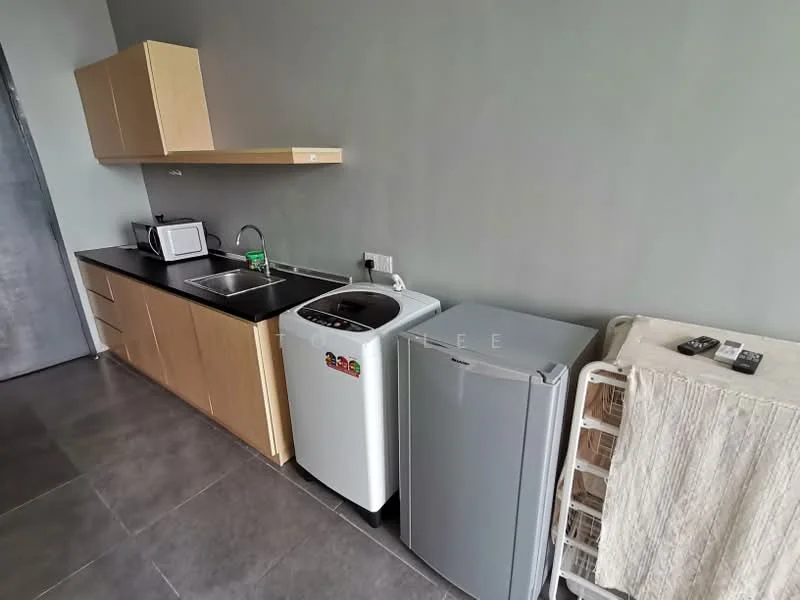 Kitchen features: black countertop, wood cabinetry, microwave, stainless-steel sink, single-bowl sink, washing machine, fridge, grey tiled flooring, wall-mounted shelf, kitchen utensils, dish rack; style: modern.