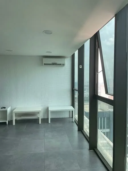 Room features: grey tile flooring, white painted walls, floor-to-ceiling windows, 1 wall-mounted split AC, 2 white side tables, city view; style: modern; view: city.