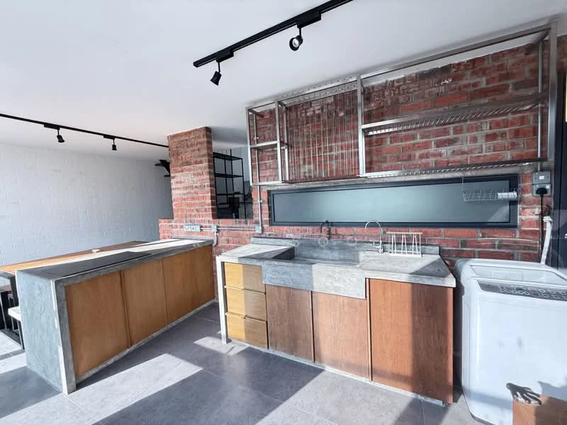 Kitchen features: exposed brick wall, grey concrete countertop, wood cabinetry with brown finish, stainless-steel sink, chrome pull-down faucet, open shelving, built-in washing machine, grey tile flooring, recessed LED downlights, industrial-style lighting fixtures; style: industrial.