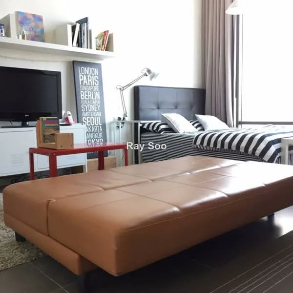 Living features: brown leather ottoman, black upholstered bed with headboard, striped bedding, white shelving unit, black TV console, flat-screen TV, desk lamp, red side table, grey area rug, curtains, floor-to-ceiling window; style: modern.