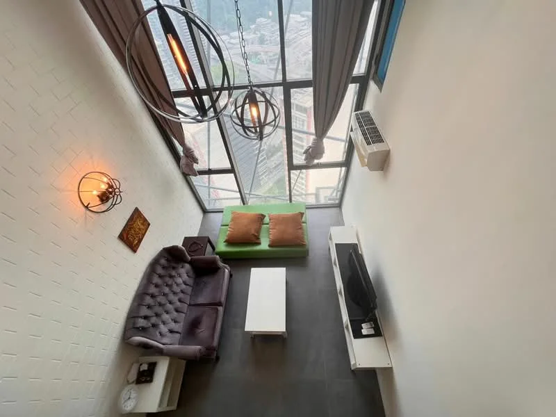 Living features: floor-to-ceiling windows, grey accent wall, dark tile flooring, 3-seater fabric sofa in dark grey, 2 green cushions, white coffee table, TV console in white, wall-mounted TV, 1 wall-mounted split AC, chandelier with multiple bulbs, decorative wall art; style: modern; view: city.