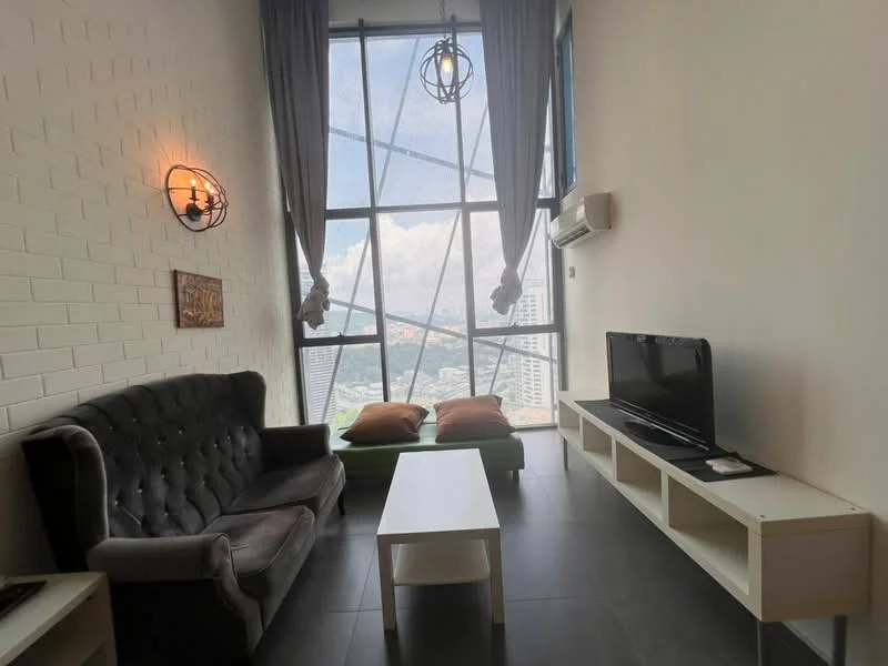 Living features: grey tufted fabric sofa, white coffee table, wall-mounted TV, white TV console, large floor-to-ceiling windows, grey curtains, air conditioning unit, exposed brick wall, dark tile flooring, decorative wall sconce lighting; style: modern; view: city.
