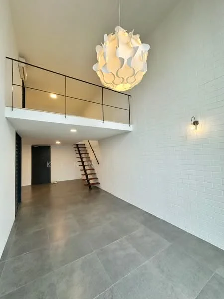 Room features: white painted walls, exposed brick wall, grey tile flooring, staircase with wooden steps, metal railing, large pendant light fixture, recessed ceiling lights, wall-mounted sconce; style: modern.