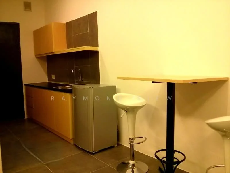 Kitchen features: black countertop, wood cabinetry, stainless-steel sink, chrome faucet, built-in kitchen cabinets, refrigerator, bar table, stool seating, grey tile flooring, white painted walls; style: modern.