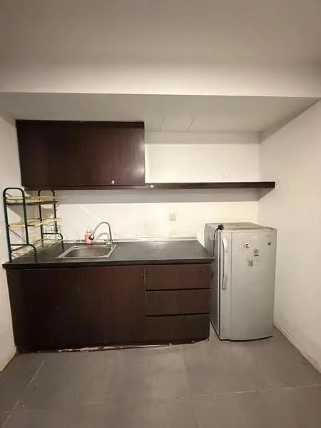 Kitchen features: dark wood cabinetry, black countertop, single-bowl stainless-steel sink, chrome pull-down faucet, open shelving above countertop, refrigerator, grey tiled flooring, white painted walls; style: modern.