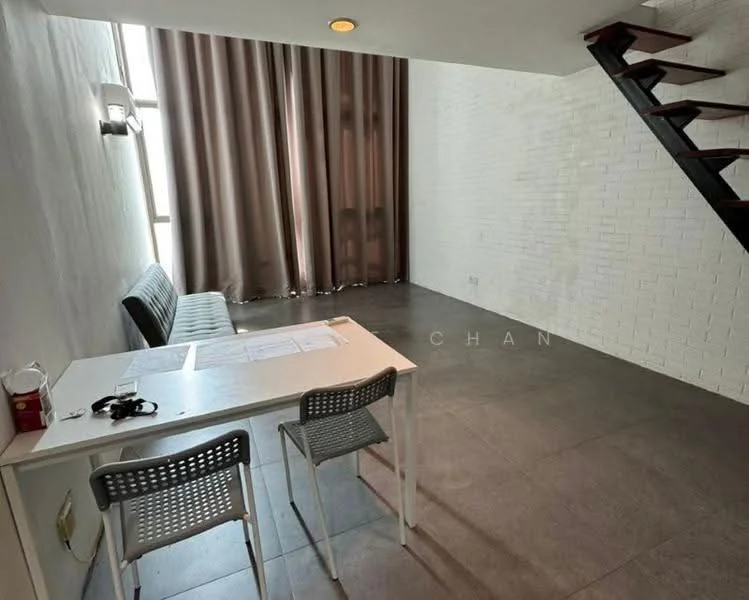 Room features: white painted walls, exposed brick wall, grey tile flooring, large windows, floor-to-ceiling curtains, staircase, table, two chairs, wall-mounted light fixture; style: modern.