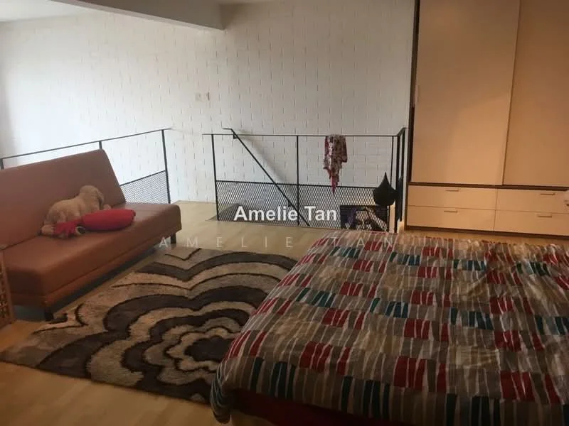 Room features: wooden flooring, white painted walls, sofa with red cushions, area rug with geometric pattern, bed with patterned bedding, metal railing, built-in wardrobe, decorative items on railing; style: modern.