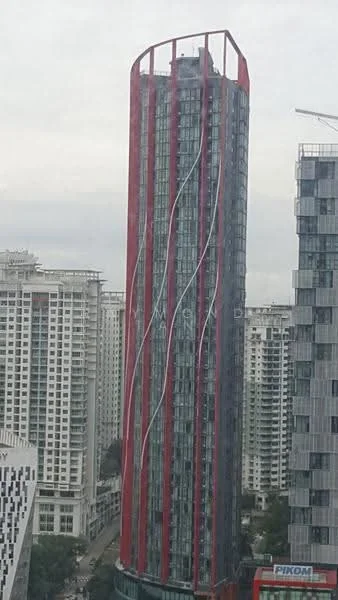 Exterior type: high-rise condominium; features: glass curtain wall, red accent facade, curved architectural design, approximately 20-storey high-rise, surrounded by urban landscape, visible neighboring buildings; style: modern.