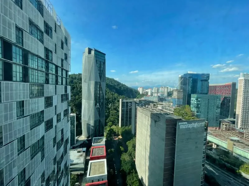 Exterior type: high-rise condominium; features: glass curtain wall, concrete facade, surrounded by greenery, urban skyline view, adjacent to highway; style: modern.