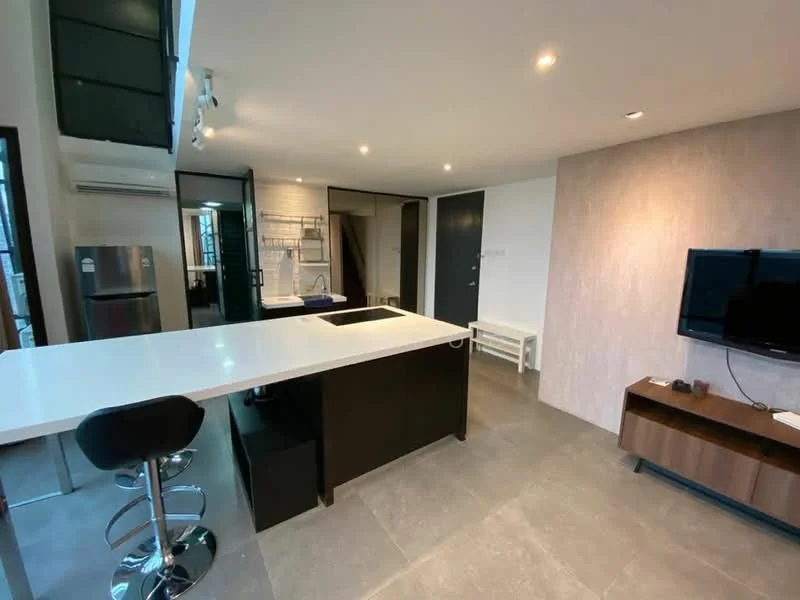 Living features: open-plan layout, large island countertop with bar seating, black cabinetry, stainless-steel fridge, wall-mounted TV, light-colored wall with textured finish, recessed downlights, sliding glass door, floor-to-ceiling windows, grey tile flooring, air conditioning unit; style: modern.