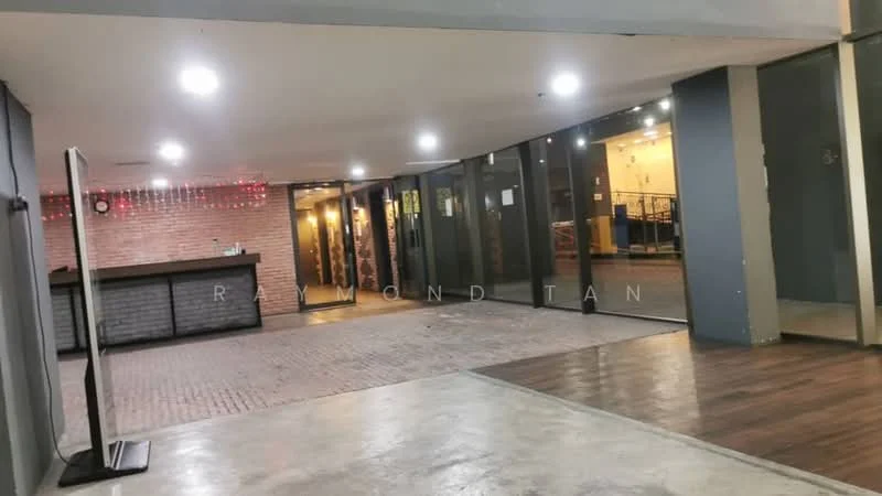 Room features: exposed brick wall, concrete flooring, wooden flooring, large glass windows, recessed lighting, open layout, bar counter, decorative wall lights; style: modern.