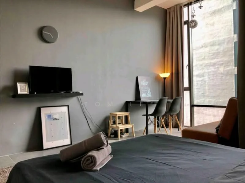 Room features: grey painted walls, floor-to-ceiling windows, curtains, wall-mounted TV, shelf with decorative items, small dining table with chairs, floor lamp, rolled towels, wooden stool, brown leather chair, concrete flooring, clock on wall; style: modern.
