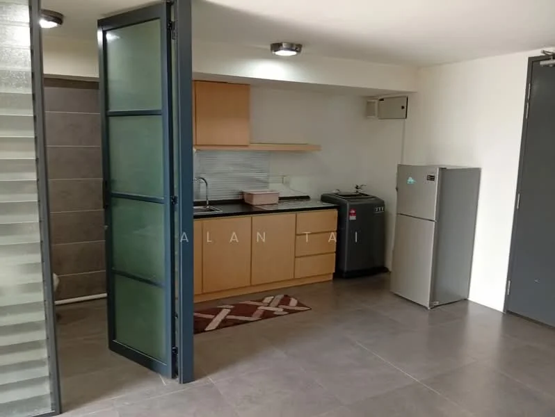 Kitchen features: wood cabinetry, black countertop, single-bowl stainless-steel sink, chrome pull-down faucet, built-in stove, refrigerator, grey tiled backsplash, area rug with geometric pattern, wall-mounted air conditioning unit, recessed downlights; style: modern. Room features: grey tiled flooring, glass door, open layout.