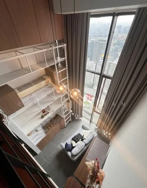 Living features: floor-to-ceiling windows, grey fabric sofa, area rug, hanging pendant lights, wooden shelving unit, white painted walls, dark wood flooring, air conditioning unit, curtains, decorative plants; style: modern; view: city.