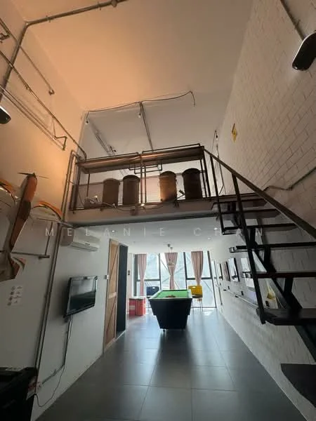 Room features: exposed brick walls, metal railing, open loft area, large windows, grey tile flooring, ceiling lights, air conditioning unit, staircase, pool table, curtains, wall-mounted TV, wooden door; style: modern; view: city.