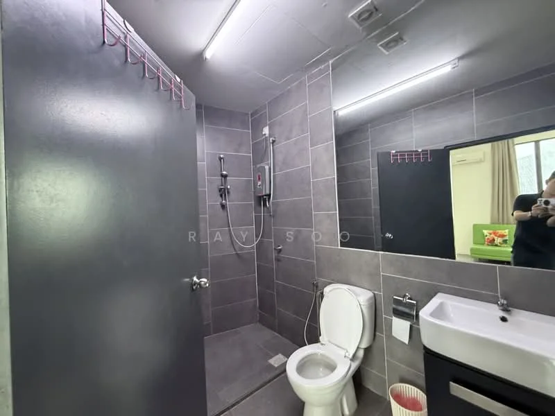 Bathroom features: grey tiled walls, grey tiled flooring, walk-in shower with glass enclosure, rain shower head, handheld shower, single-sink vanity with white cabinet, chrome basin mixer, framed mirror, one-piece toilet, towel rack, LED ceiling lights; style: modern.