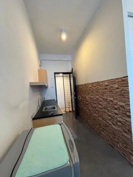 Laundry features: two stainless-steel sinks, black countertop, light wood cabinetry, textured stone accent wall, grey tile flooring, single light fixture, washer and dryer unit, open layout; style: modern.