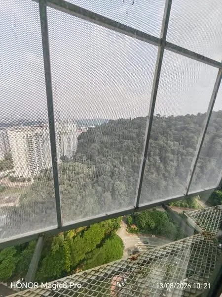 Exterior type: high-rise condominium; features: mesh balcony railing, view of greenery, surrounded by trees, urban landscape, city skyline in background; style: modern.